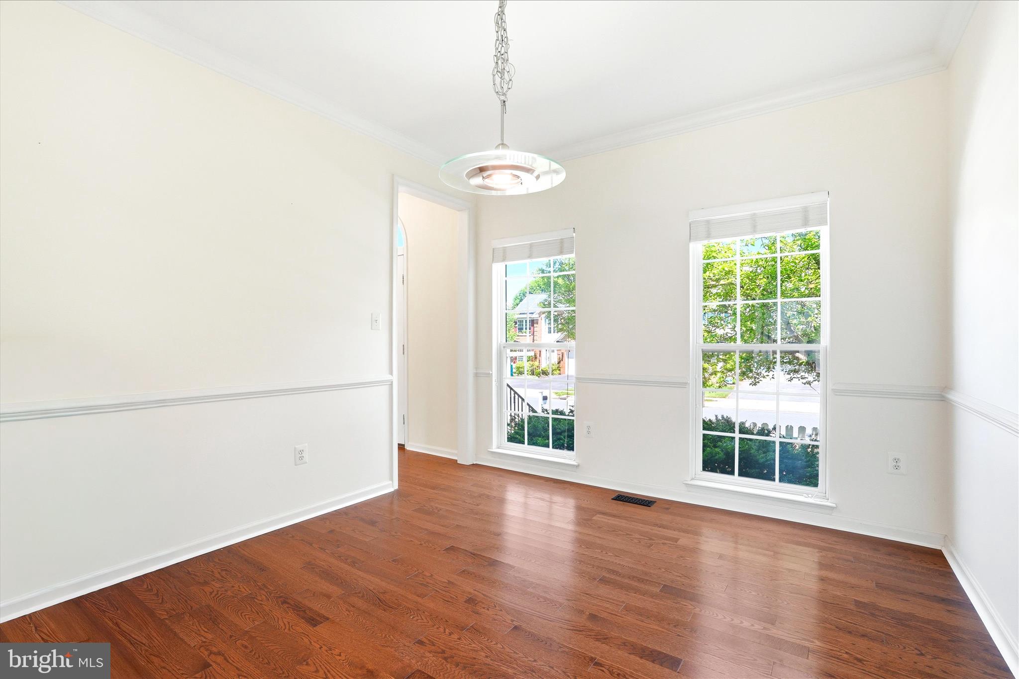 9009 Bealls Farm Road Frederick, MD 21704 - Photo 11 of 41 a view of a room with wooden floor and windows