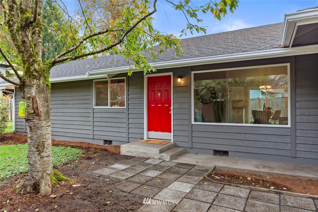 20711 Filbert Drive Bothell, WA 98012 - Photo 2 of 25 a front view of a house with a porch