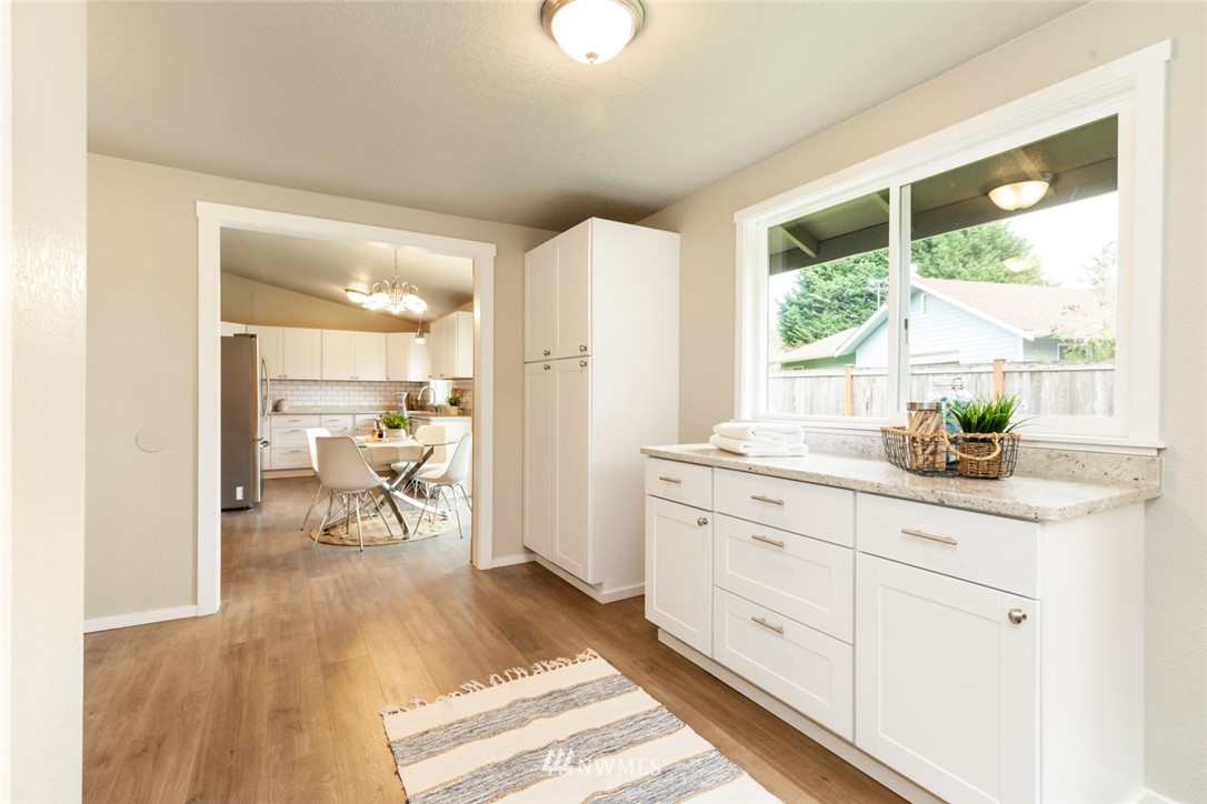 20711 Filbert Drive Bothell, WA 98012 - Photo 15 of 25 a spacious bathroom with double vanity and a window