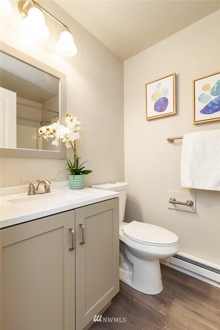 20711 Filbert Drive Bothell, WA 98012 - Photo 19 of 25 a bathroom with a sink mirror and toilet