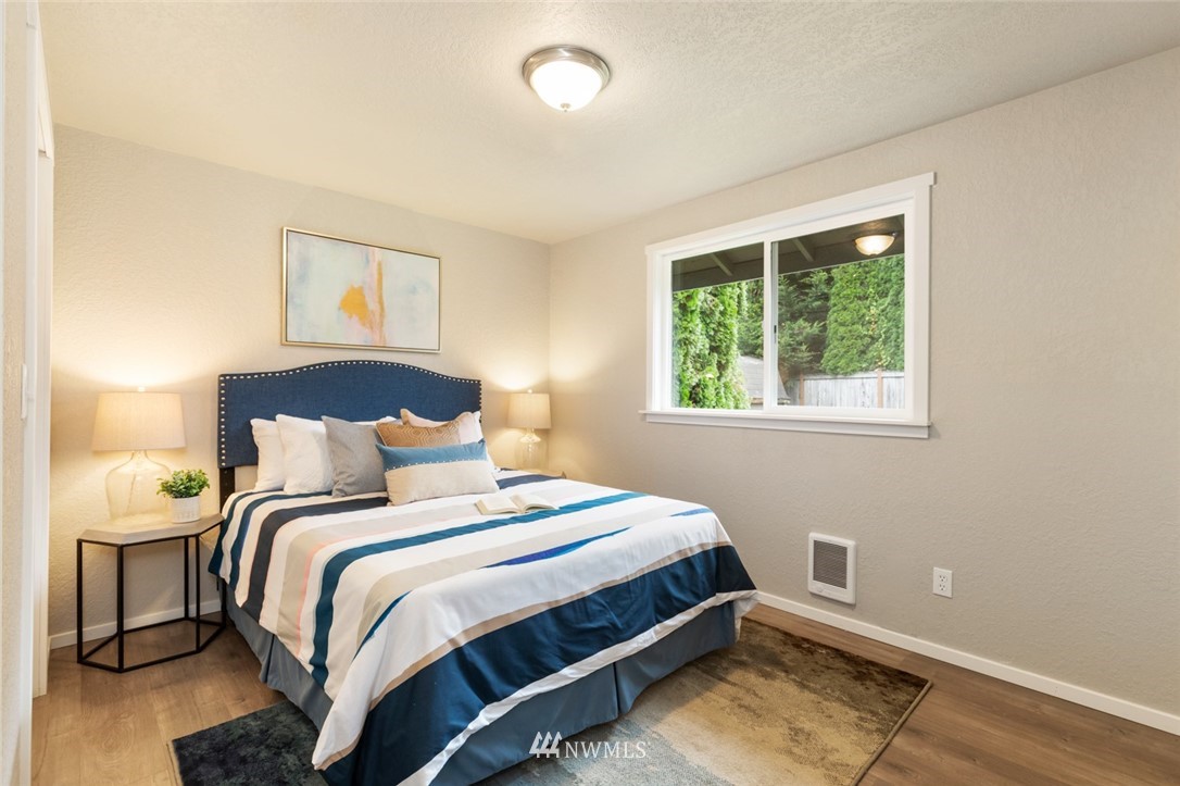 20711 Filbert Drive Bothell, WA 98012 - Photo 20 of 25 a bedroom with a bed and a window