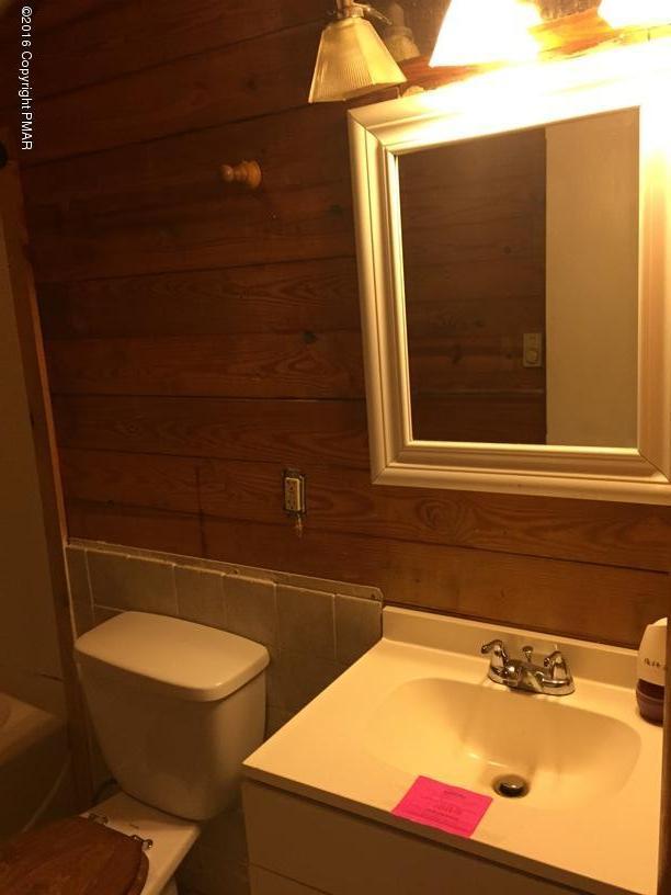 110 Center Avenue Mount Pocono, PA 18344 - Photo 11 of 14 a bathroom with a sink and a toilet