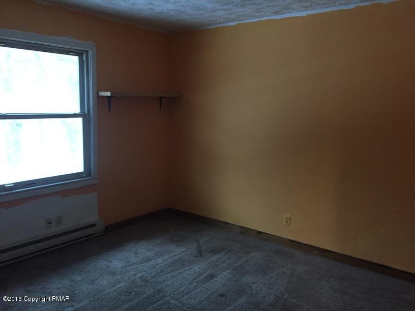 110 Center Avenue Mount Pocono, PA 18344 - Photo 12 of 14 a view of an empty room and a window