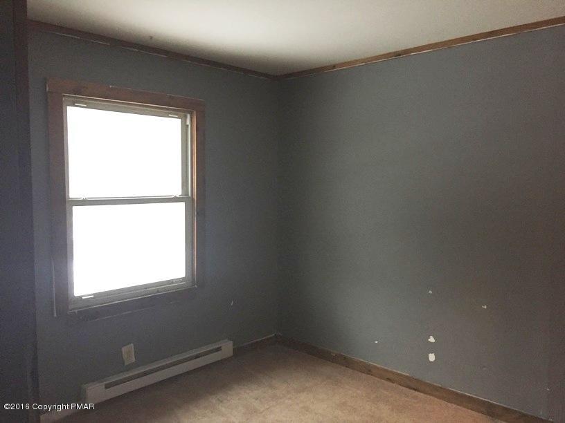 110 Center Avenue Mount Pocono, PA 18344 - Photo 9 of 14 an empty room with a window
