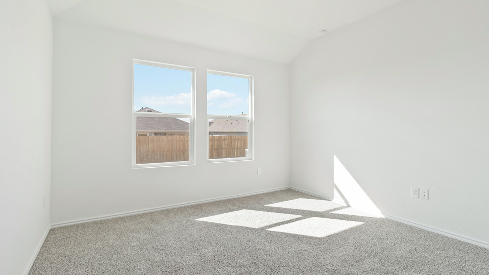 265 Balmorhea Street Kyle, TX 78640 - Photo 16 of 25 a view of an empty room with a window
