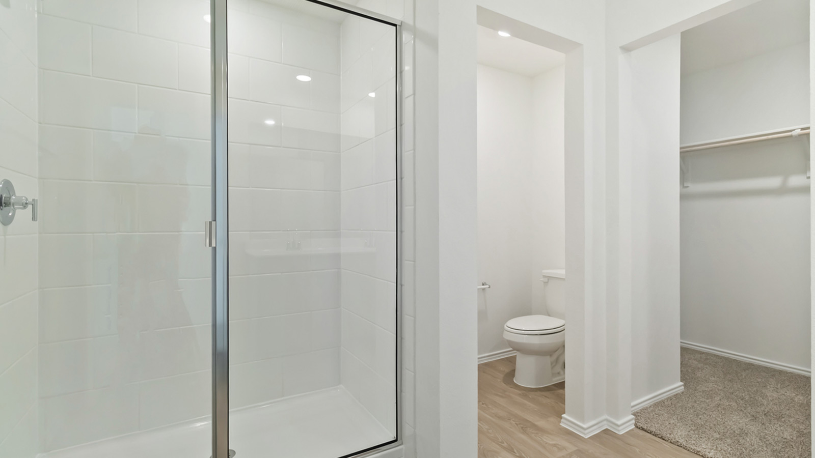 265 Balmorhea Street Kyle, TX 78640 - Photo 19 of 25 a bathroom with a shower and a toilet