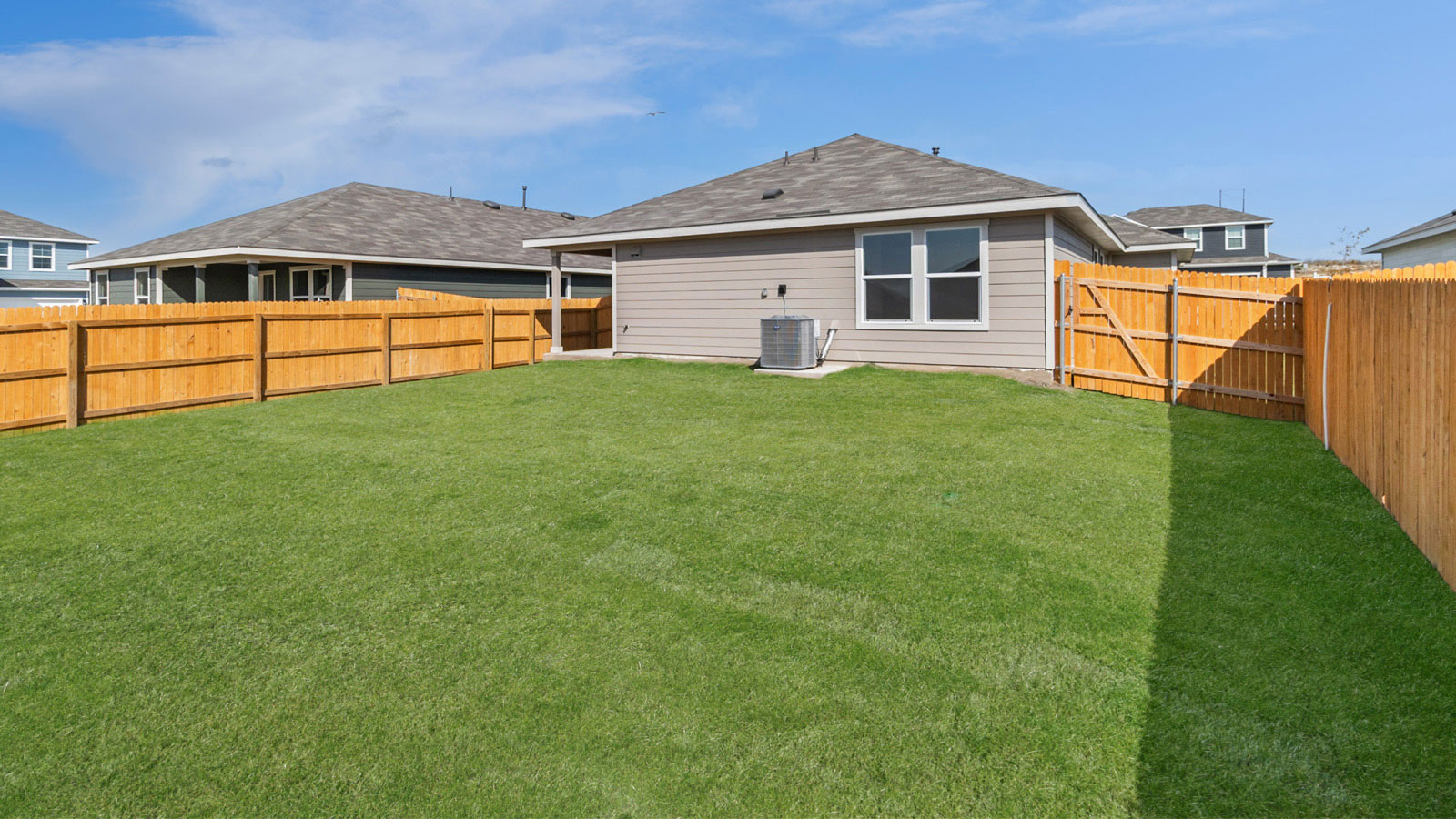 265 Balmorhea Street Kyle, TX 78640 - Photo 25 of 25 a front view of a house with a yard
