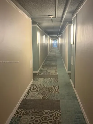 a bathroom with a double vanity sink toilet and shower