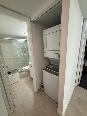 a view of hallway with livingroom