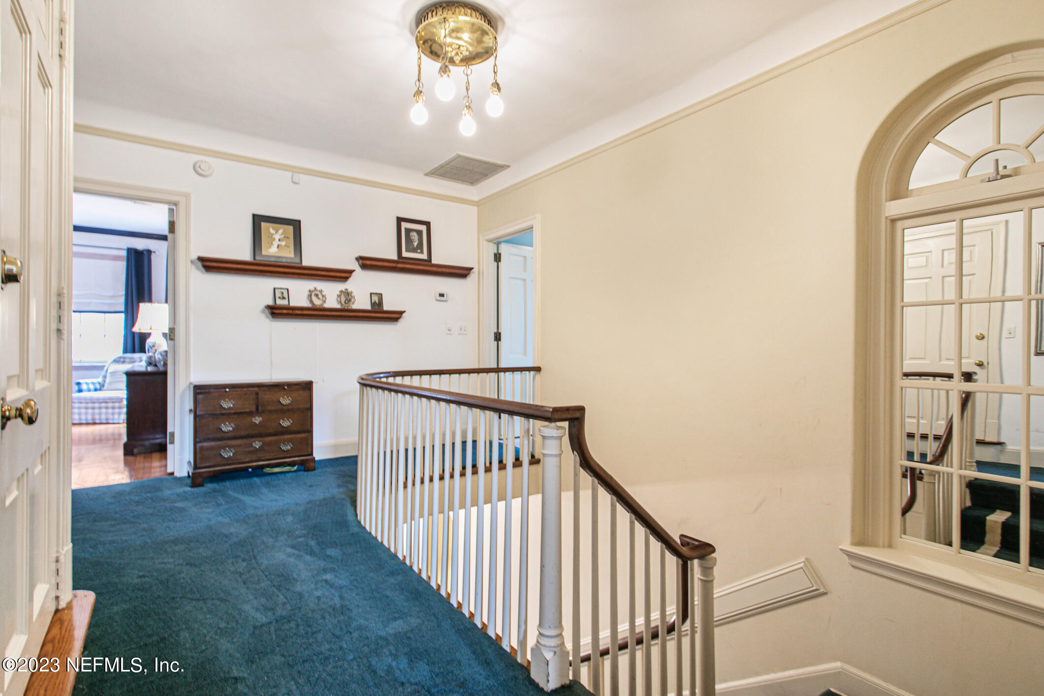 2103 River Road Jacksonville, FL 32207 - Photo 23 of 67 a view of a livingroom with furniture and staircase