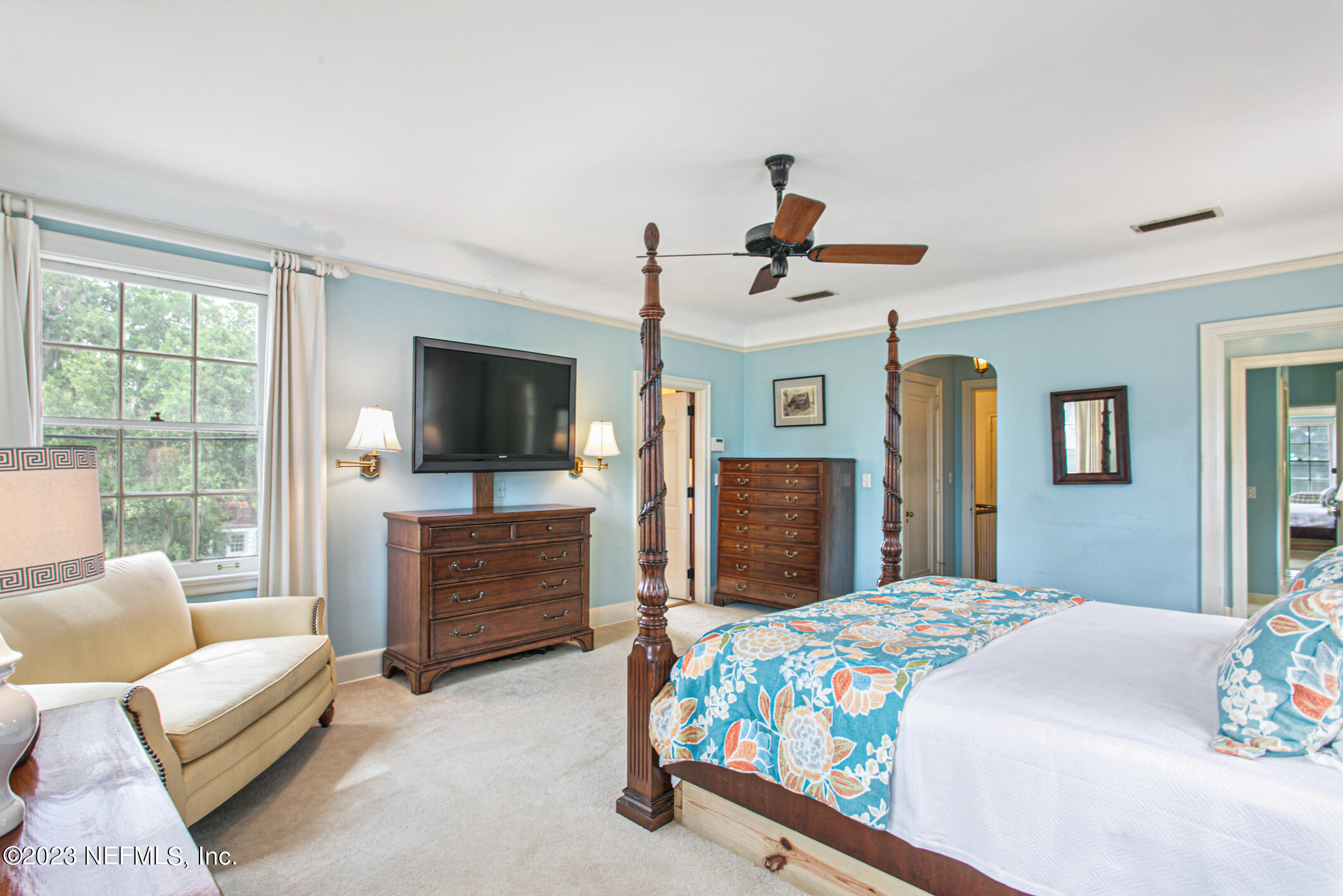 2103 River Road Jacksonville, FL 32207 - Photo 26 of 67 a bedroom with a bed and a flat screen tv