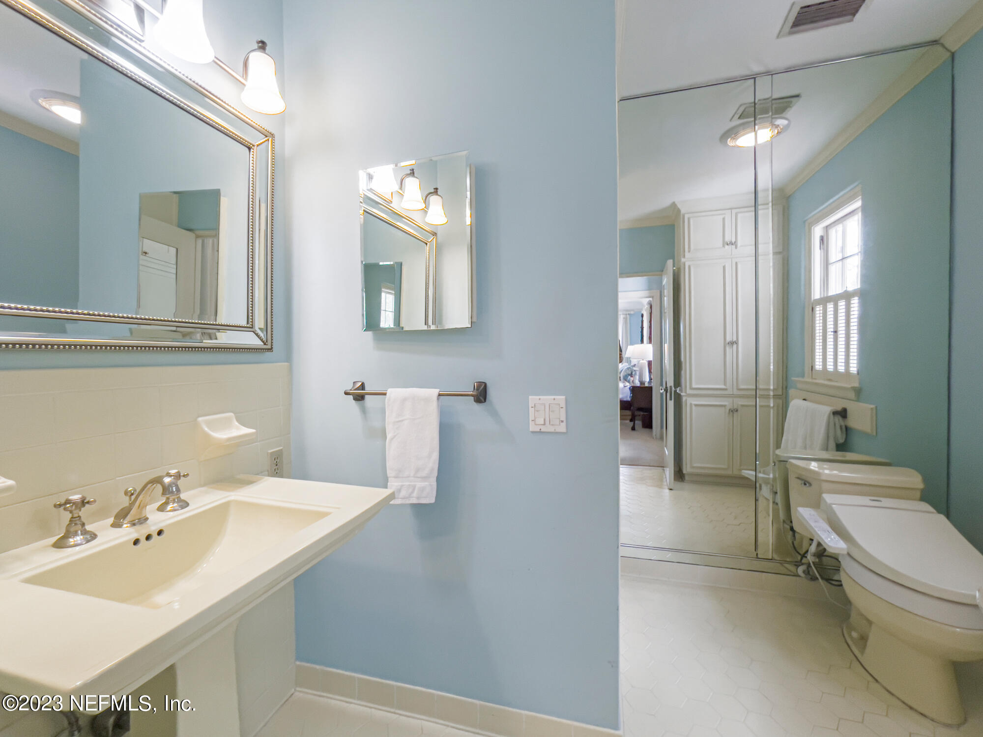 2103 River Road Jacksonville, FL 32207 - Photo 29 of 67 a bathroom with a sink a toilet and shower