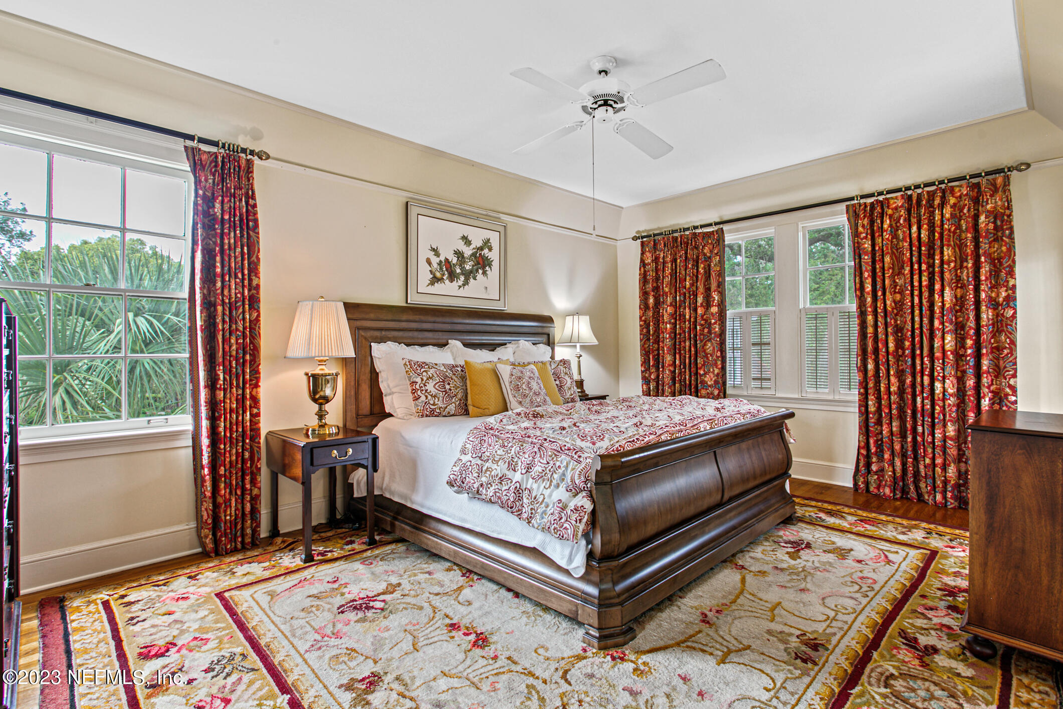 2103 River Road Jacksonville, FL 32207 - Photo 31 of 67 a bed sitting in a bedroom next to a window