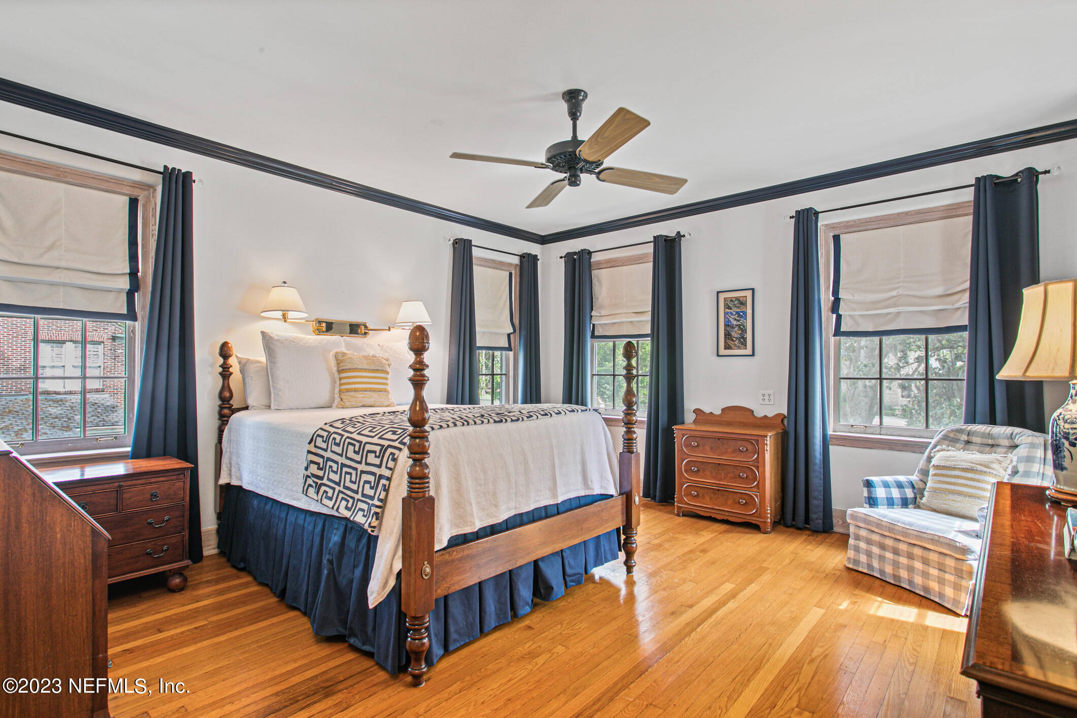 2103 River Road Jacksonville, FL 32207 - Photo 35 of 67 a bedroom with a bed couch and a window