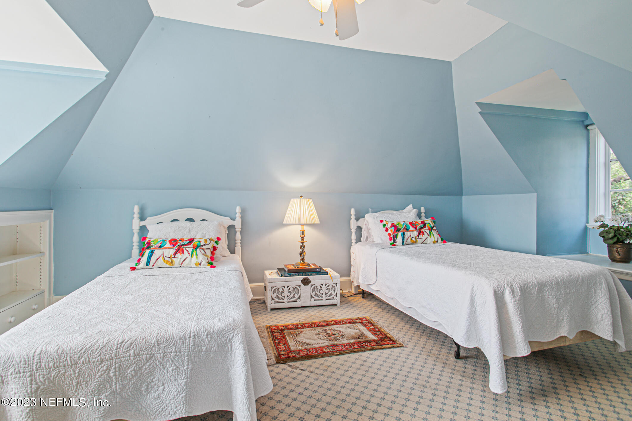 2103 River Road Jacksonville, FL 32207 - Photo 39 of 67 a bedroom with a bed and a couch