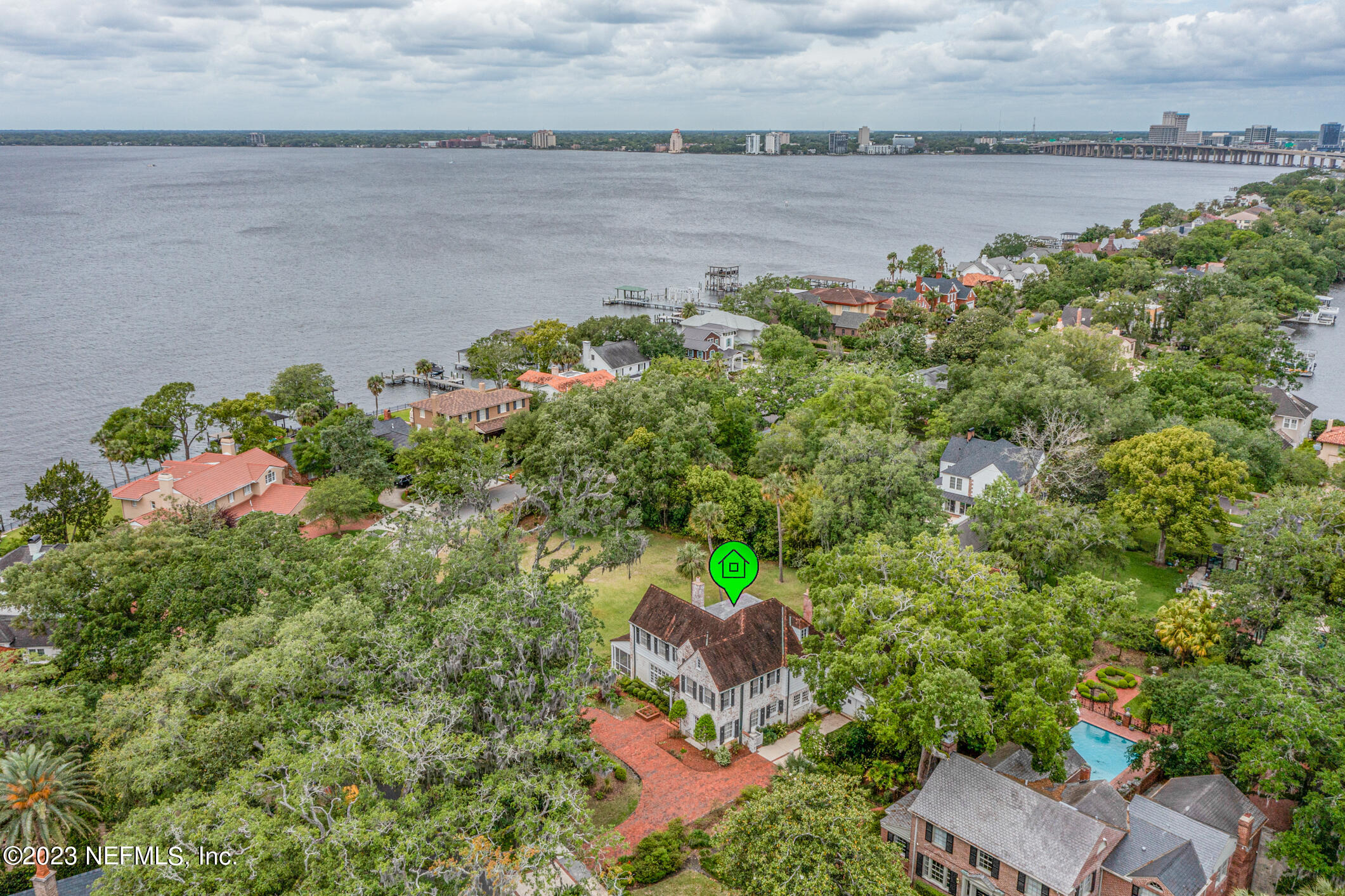 2103 River Road Jacksonville, FL 32207 - Photo 4 of 67 a picture of a lake with a building in the background