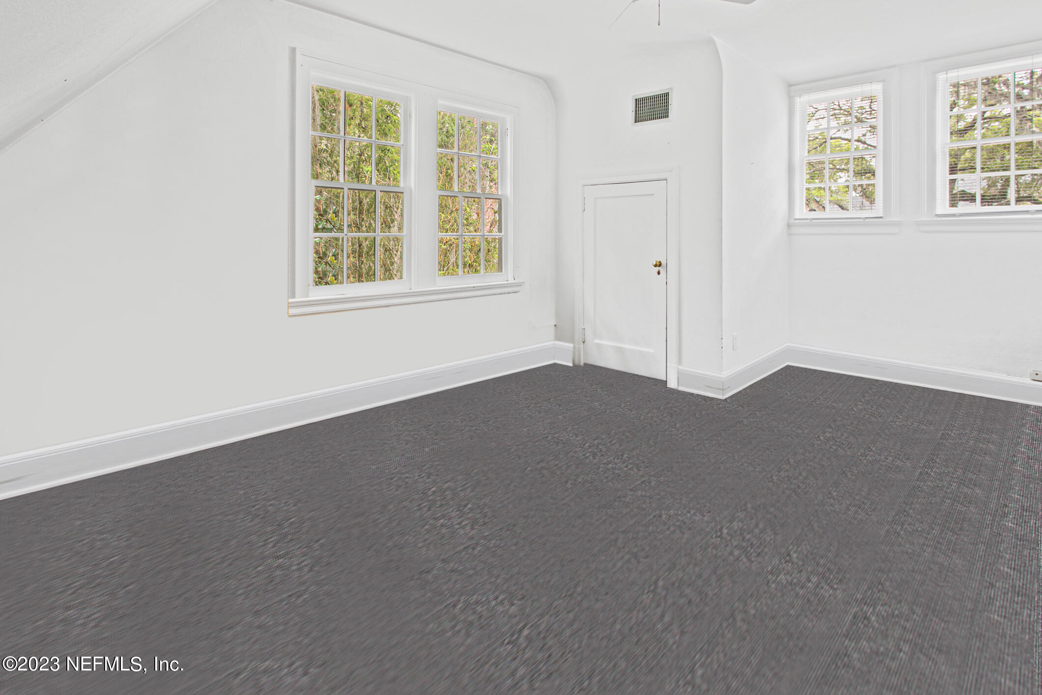 2103 River Road Jacksonville, FL 32207 - Photo 43 of 67 an empty room with windows