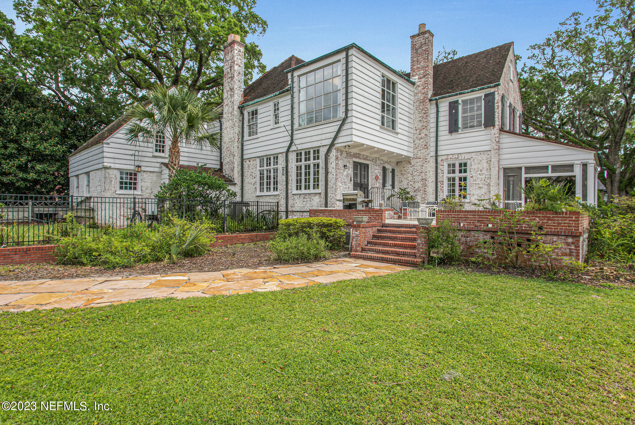 2103 River Road Jacksonville, FL 32207 - Photo 47 of 67 a view of a house with a yard and sitting area