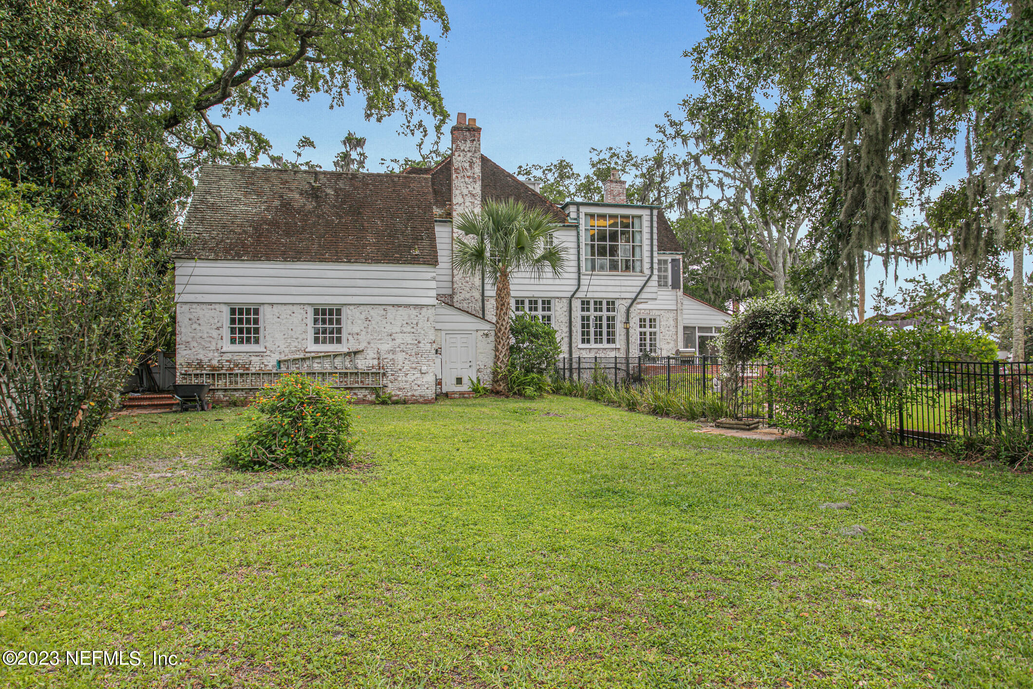 2103 River Road Jacksonville, FL 32207 - Photo 48 of 67 front view of a house with a yard
