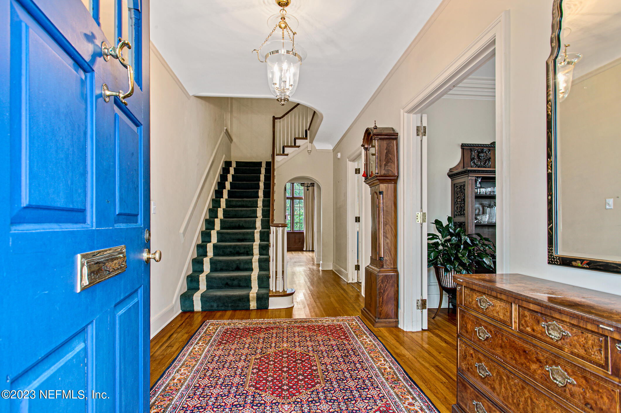 2103 River Road Jacksonville, FL 32207 - Photo 7 of 67 a view of a hallway with wooden floor and staircase