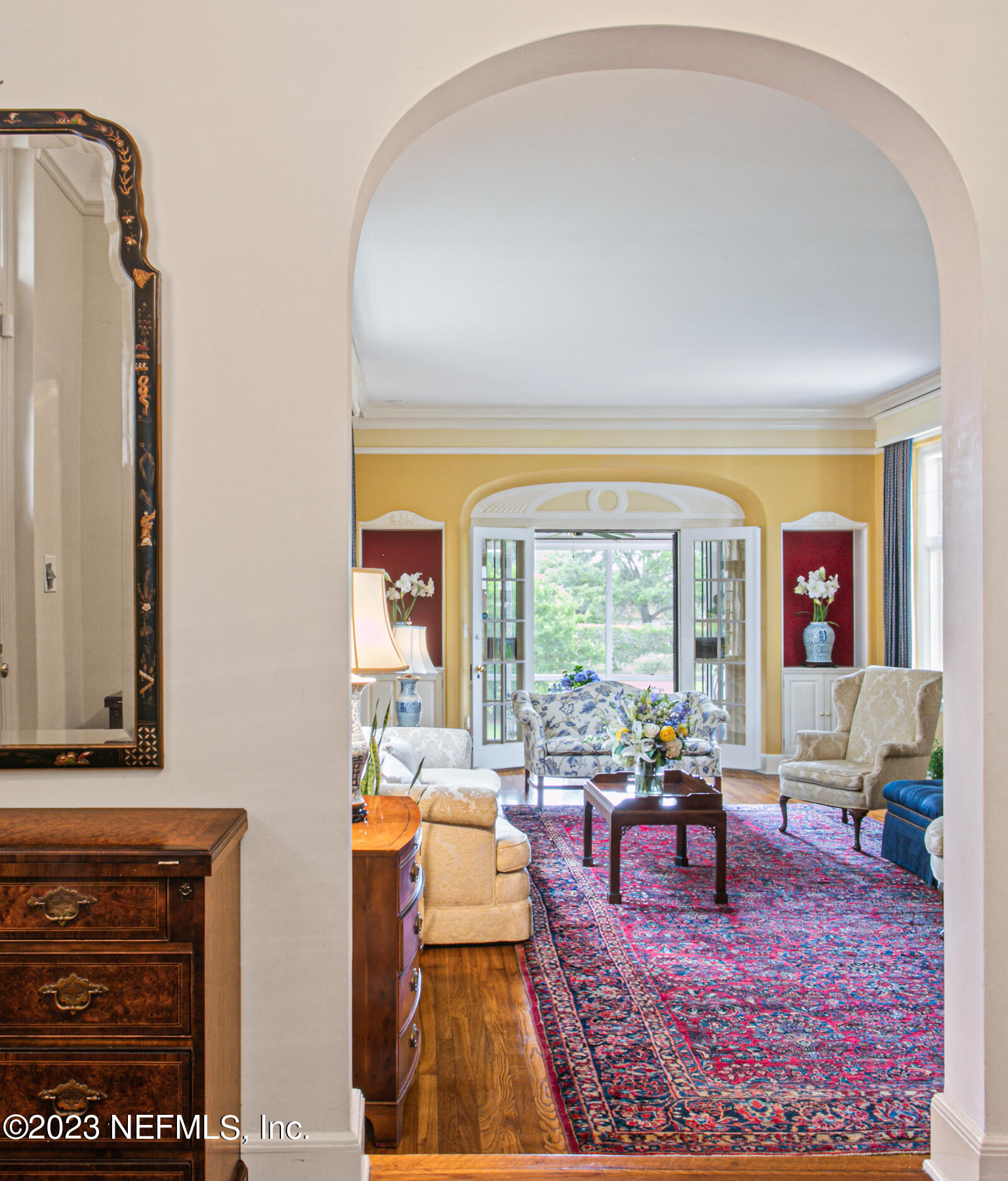 2103 River Road Jacksonville, FL 32207 - Photo 8 of 67 a living room with furniture rug and a large window