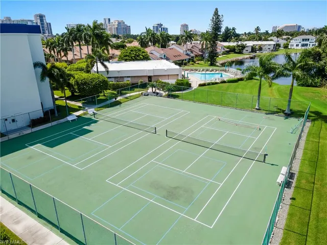 a view of an outdoor space and tennis court