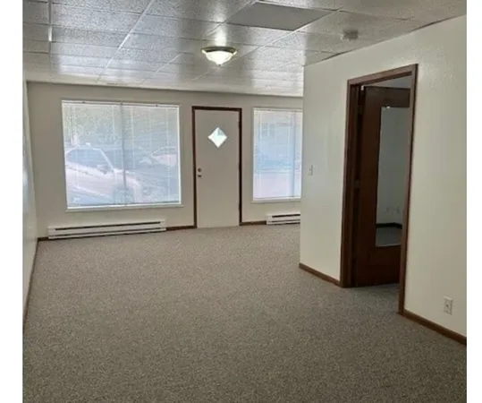 an empty room with windows