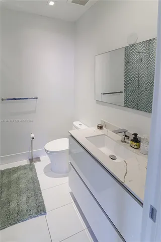 a bathroom with a sink and a toilet