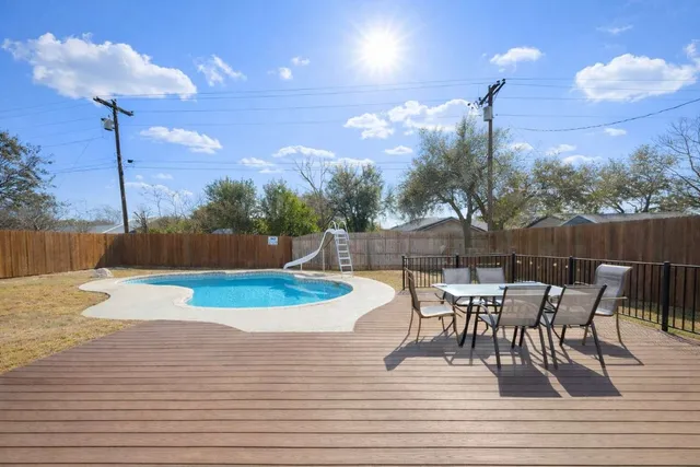 a view of a terrace with furniture