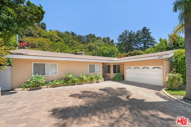 front view of a house with a street