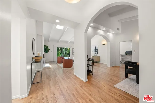a view of a living room and dining room