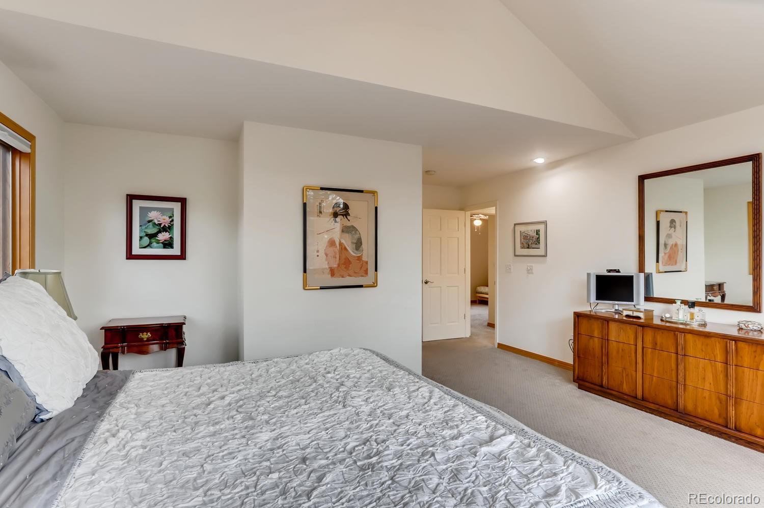 1450 Oakleaf Circle Boulder, CO 80304 - Photo 18 of 27 a bedroom with furniture and window