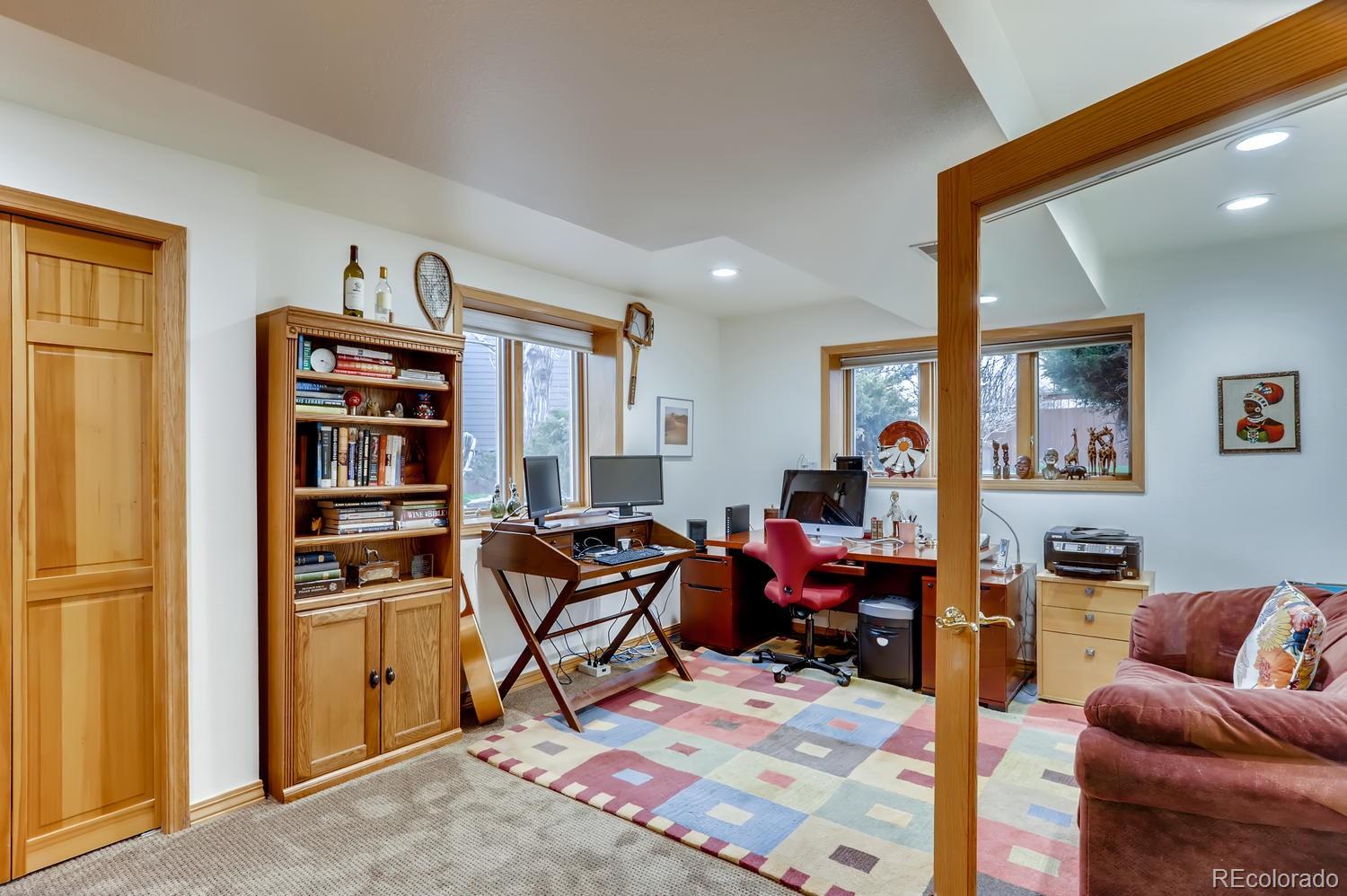1450 Oakleaf Circle Boulder, CO 80304 - Photo 23 of 27 a view of a livingroom with workspace and a couch