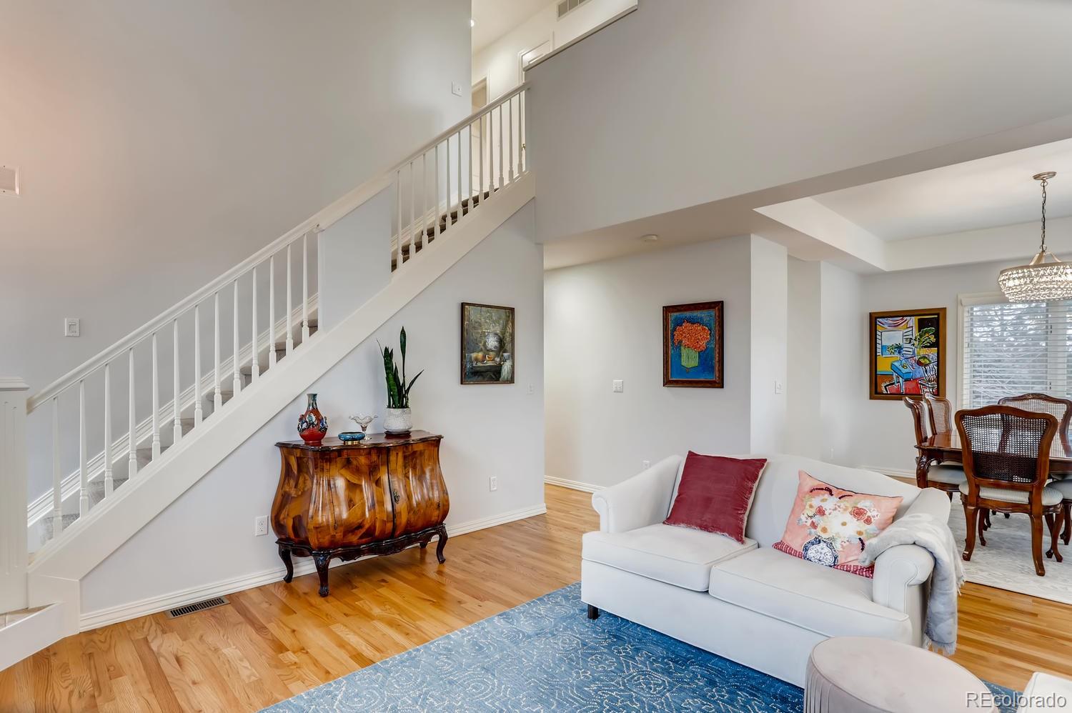 1450 Oakleaf Circle Boulder, CO 80304 - Photo 5 of 27 a living room with furniture and a rug