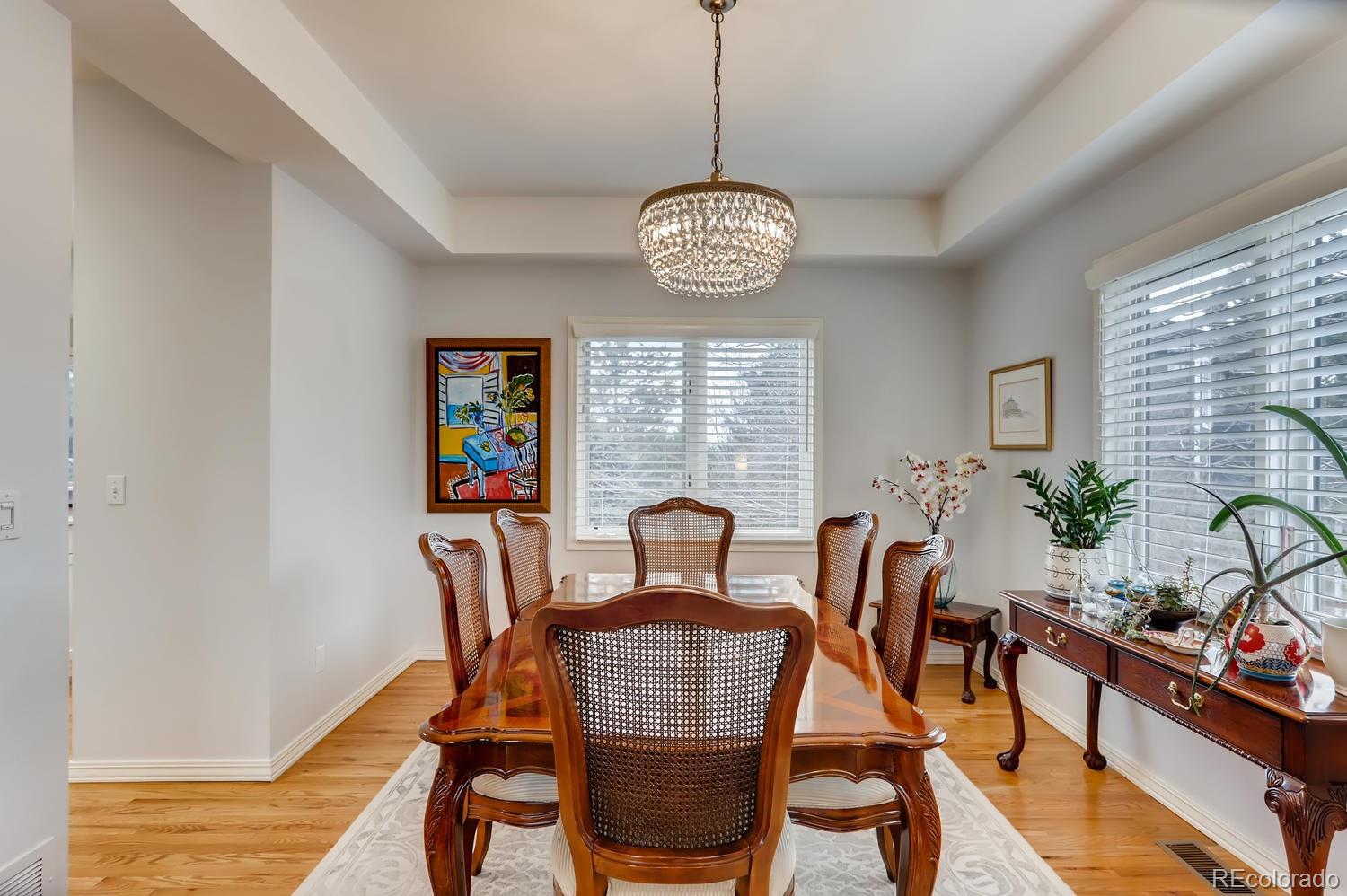 1450 Oakleaf Circle Boulder, CO 80304 - Photo 10 of 27 a view of a dining room with furniture window and wooden floor