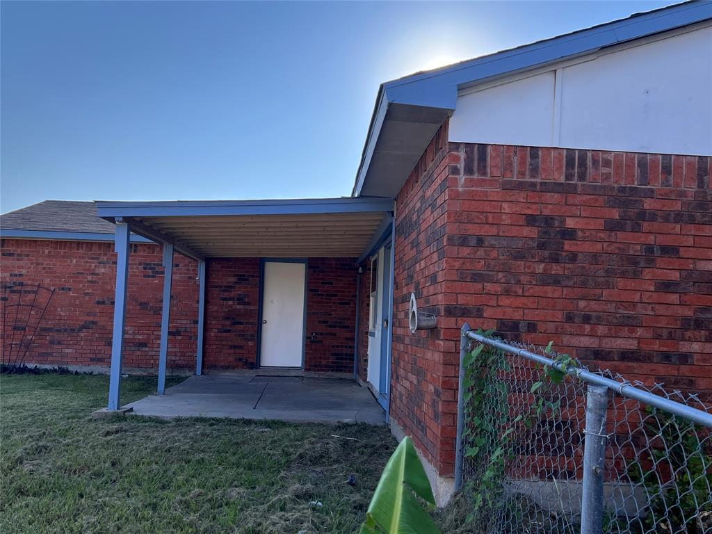 8506 Woodside Road Rowlett, TX 75088 - Photo 24 of 25 a view of a backyard of the house