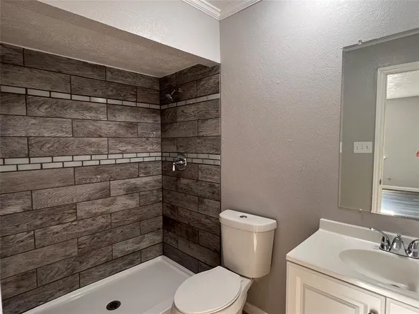 a bathroom with a sink and a toilet