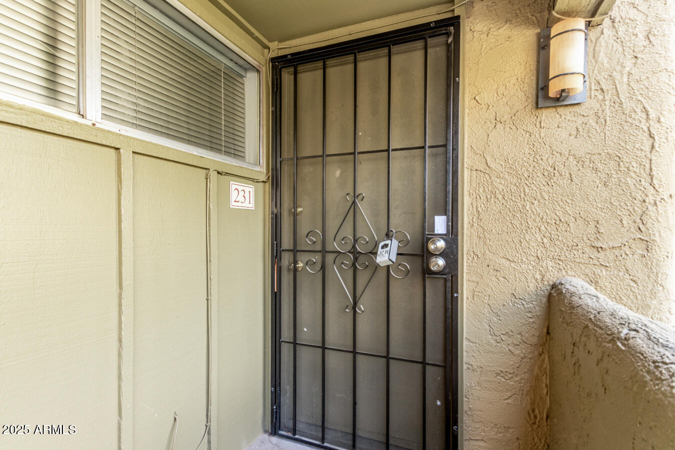 1701 West Tuckey Lane, Unit 231 Phoenix, AZ 85015 - Photo 5 of 17 a bathroom with a glass door shower