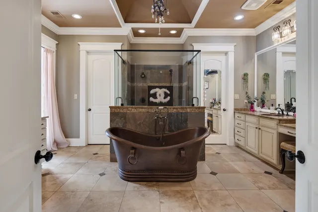 a living room with a sink and cabinets