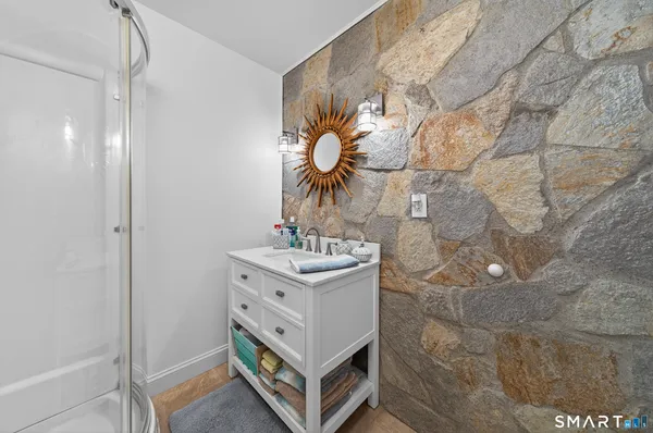 a utility room with sink dryer and washer