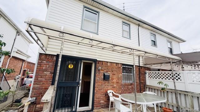 143-15 22nd Road Queens, NY 11357 - Photo 12 of 16 a front view of a house with balcony