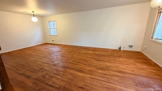 143-15 22nd Road Queens, NY 11357 - Photo 2 of 16 a view of an empty room and window