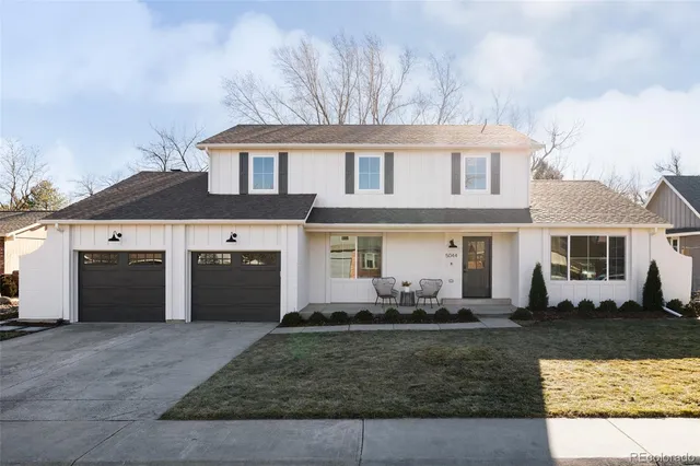 a front view of a house with yard