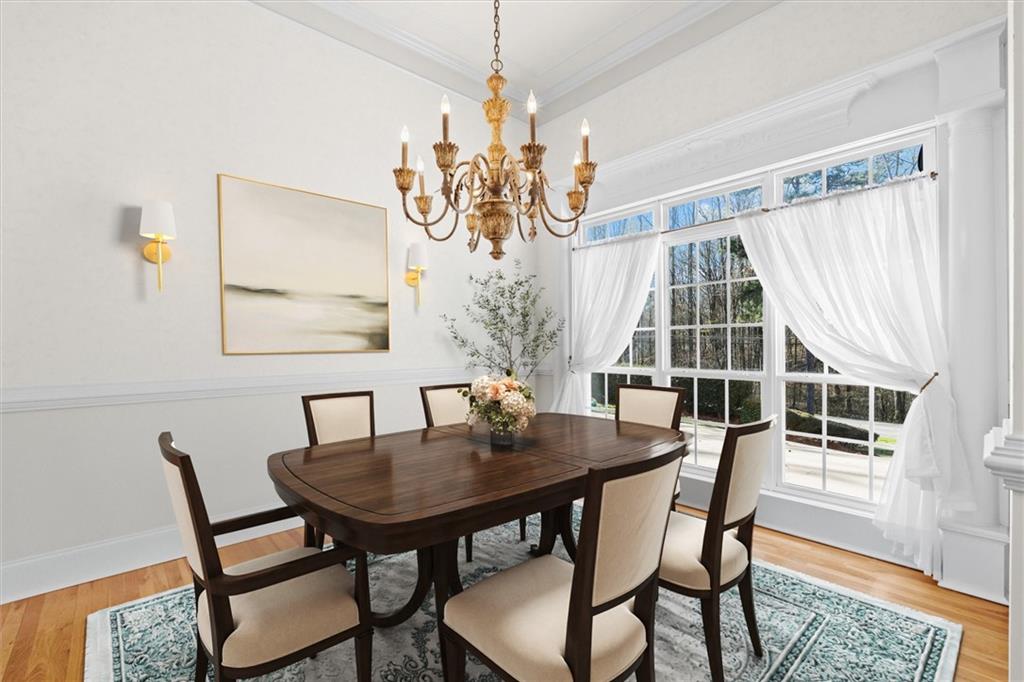 1030 Lakeview Parkway Villa Rica, GA 30180 - Photo 5 of 46 a view of a dining room with furniture and wooden floor
