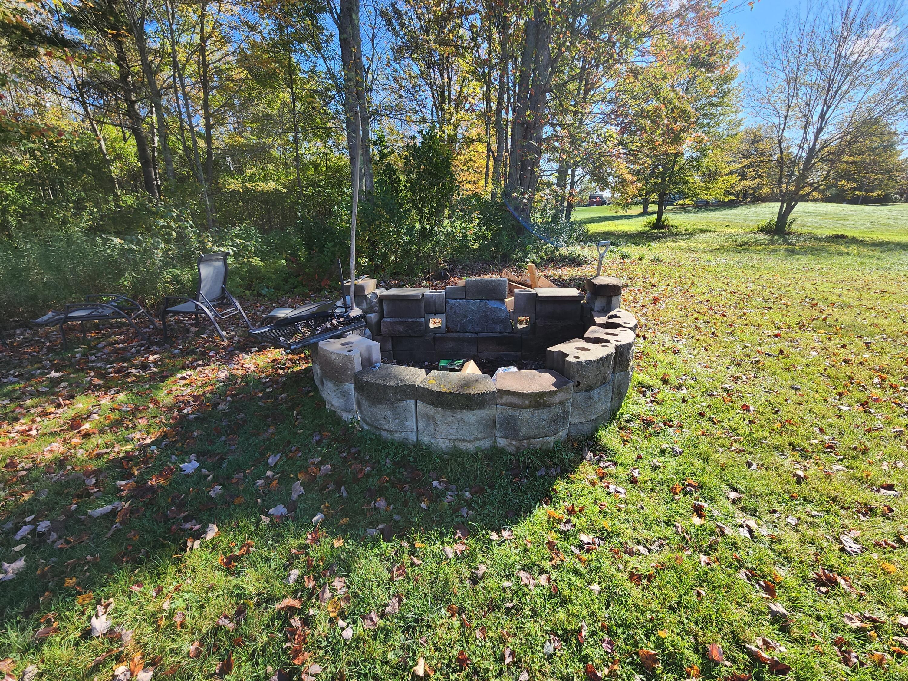 378 Strickland Loop Road Livermore Falls, ME 04254 - Photo 16 of 40 Fire Pit