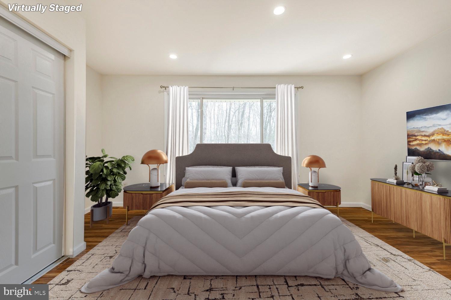 2179 White Cornus Lane Reston, VA 20191 - Photo 13 of 27 a bedroom with a bed and window