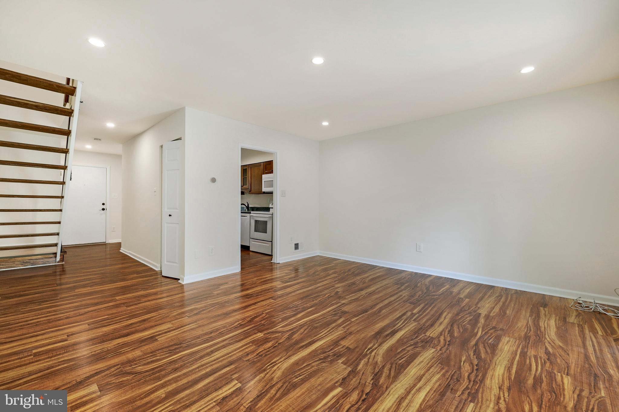 2179 White Cornus Lane Reston, VA 20191 - Photo 8 of 27 a view of empty room with wooden floor