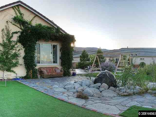 5232 North Elk River Road Reno, NV 89511 - Photo 8 of 9 a view of front a house with a yard