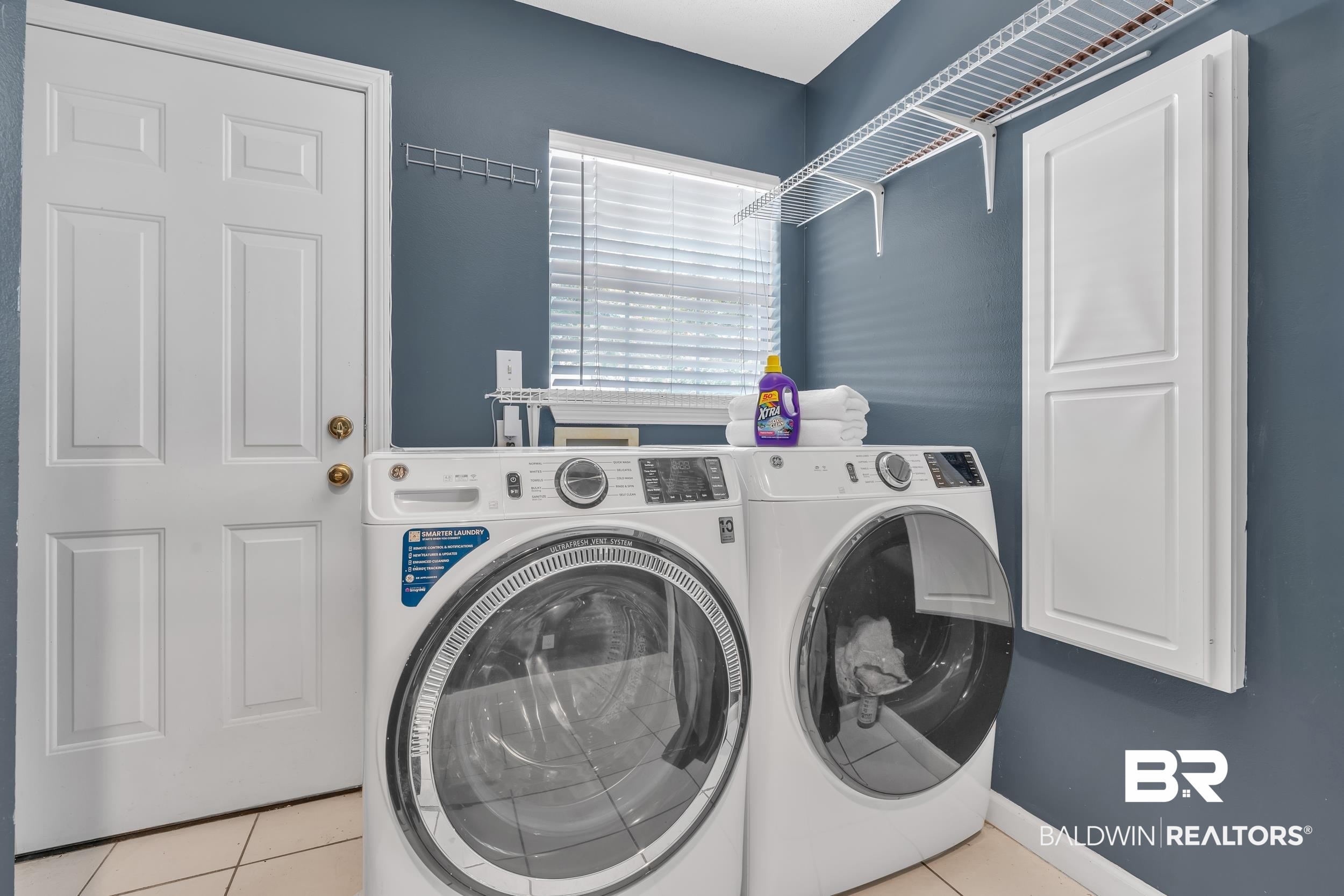 7485 Coopers Landing Road Foley, AL 36535 - Photo 14 of 20 Washroom with washing machine and dryer and tile patterned flooring