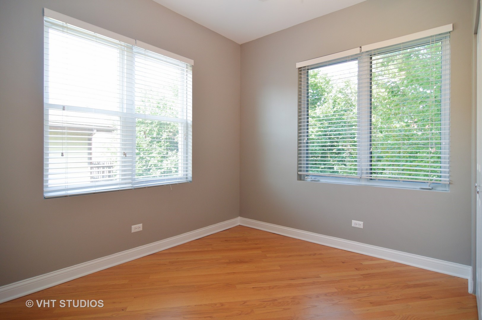 2940 North Spaulding Avenue, Unit 2N Chicago, IL 60618 - Photo 2 of 4 a view of an empty room with a window